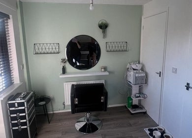 Modern makeup station at Glo Luxe Studios, Crowborough, England, GB with sleek decor and beauty tools.