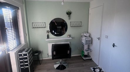 Modern makeup station at Glo Luxe Studios, Crowborough, England, GB with sleek decor and beauty tools.