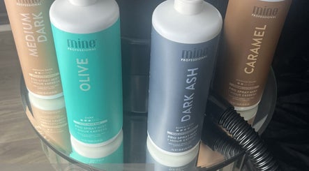 Tanning products at Glo Luxe Studios in Crowborough, England, enhancing beauty with rich colors.