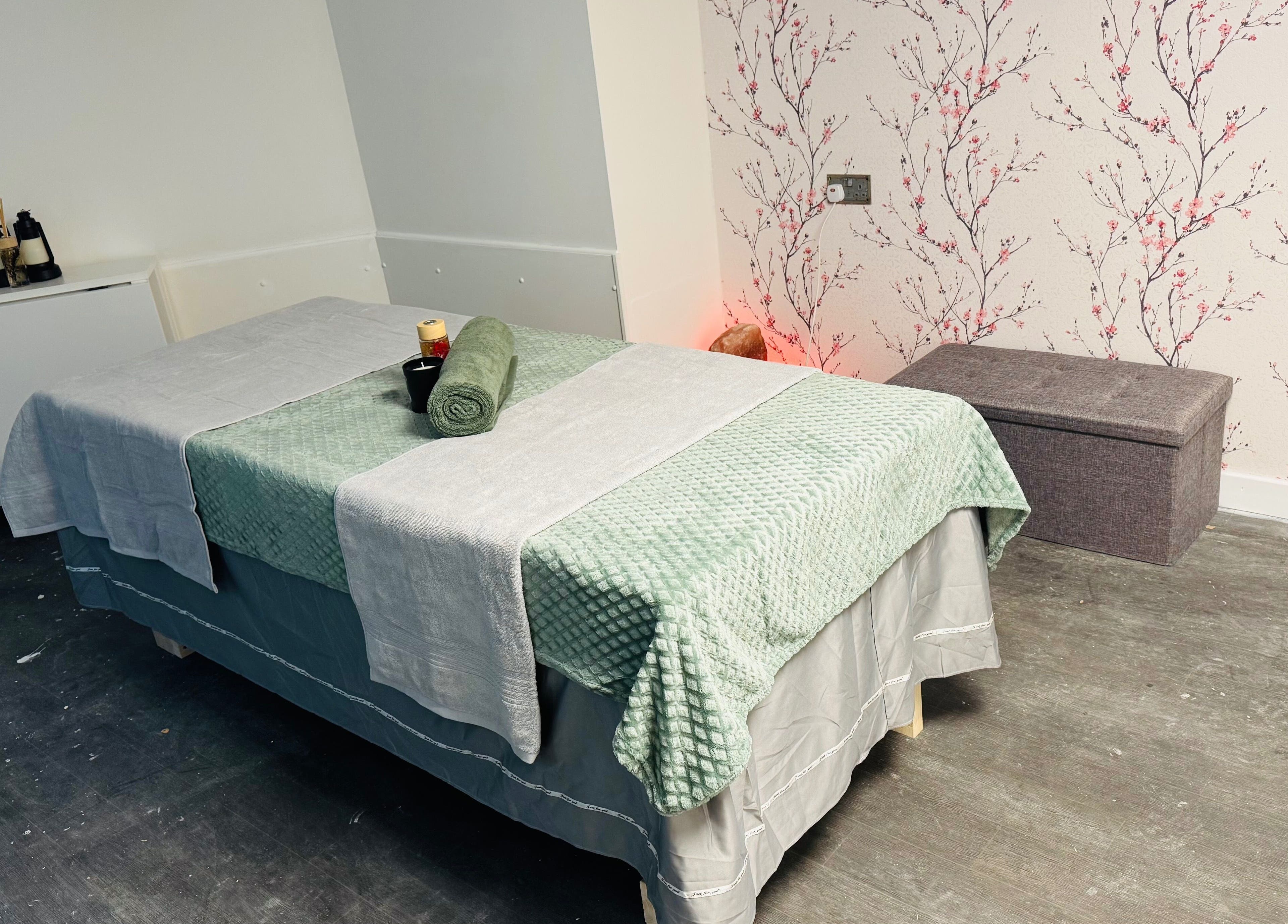 Massage room at Cloud 9 Wellness Spa & Rooms, Newcastle Under Lyme, England, GB featuring a comfy treatment bed.