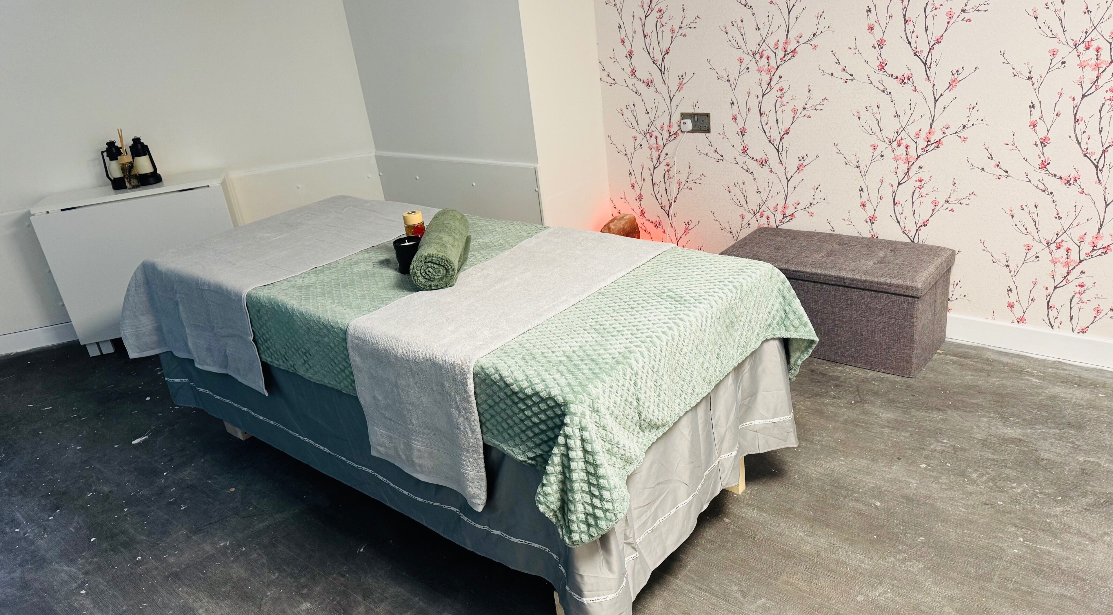 Massage room at Cloud 9 Wellness Spa & Rooms, Newcastle Under Lyme, England, GB featuring a comfy treatment bed.