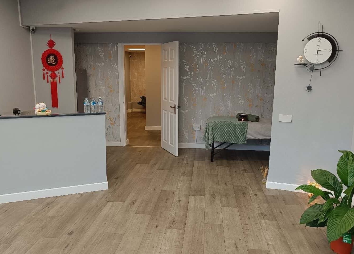 Reception area of Cloud 9 Wellness Spa & Rooms, Newcastle Under Lyme, England, featuring serene decor.