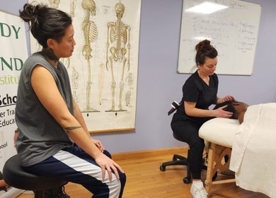 Massage students practicing at Body in Mind Massage Institute - West New York, NJ, West New York, New Jersey, US.