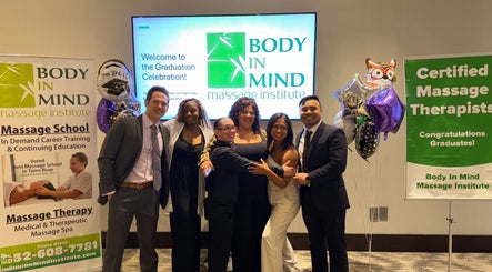 Graduates celebrating at Body in Mind Massage Institute - West New York, NJ.