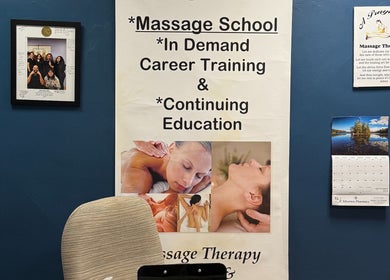 Interior wall display at Body in Mind Massage Institute - West New York, NJ, showcasing massage education materials.