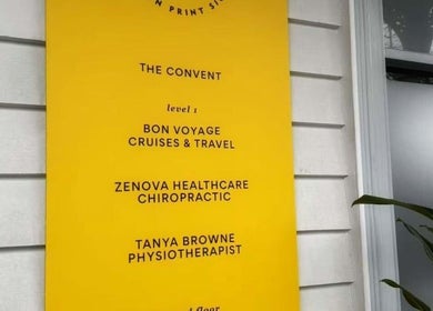 Yellow signage displaying Zenova Healthcare Chiropractic at The Convent, Auckland, Auckland, NZ.