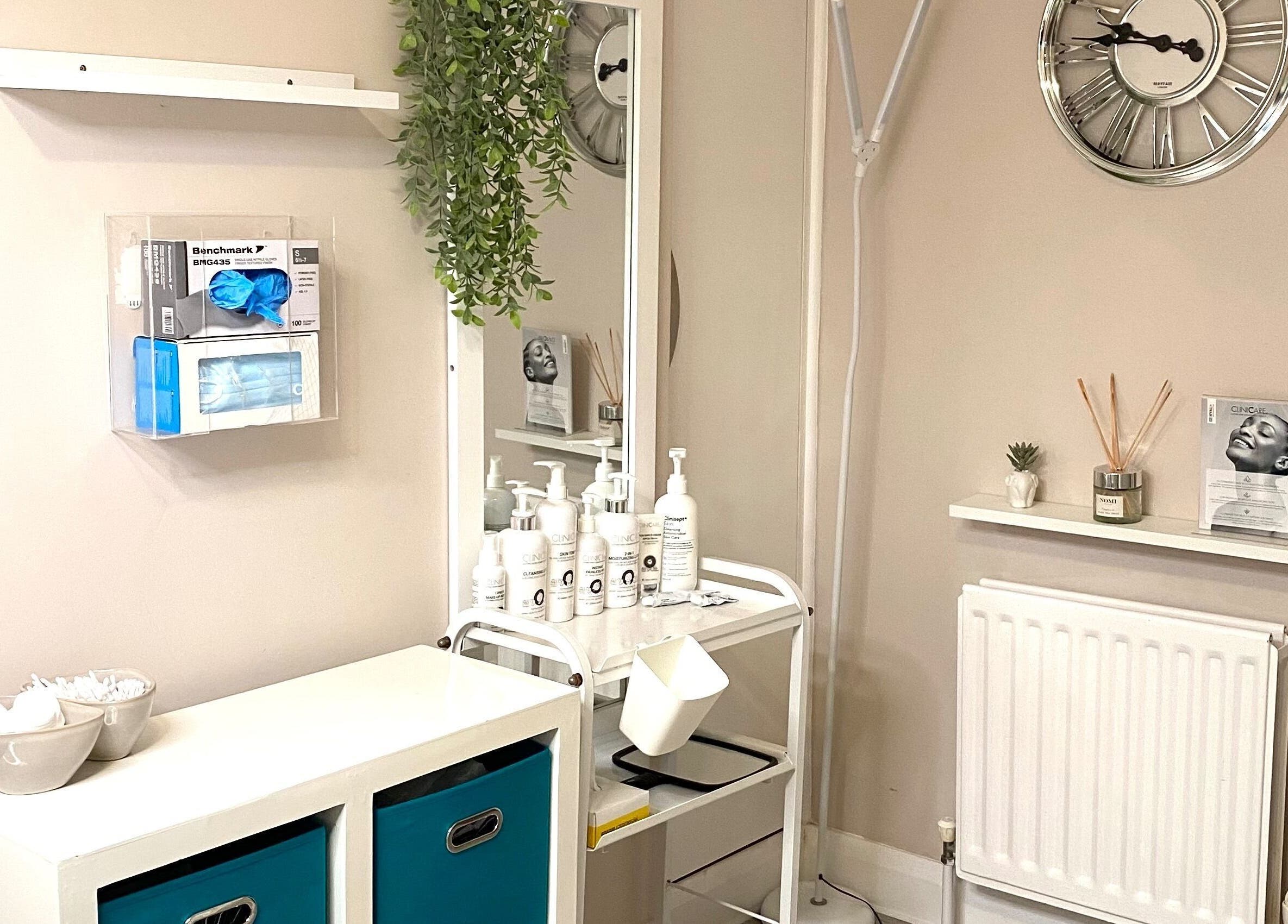 Sleek interior at Rhi.Aesthetics, Eastleigh, England, GB featuring organized skincare products and decor.