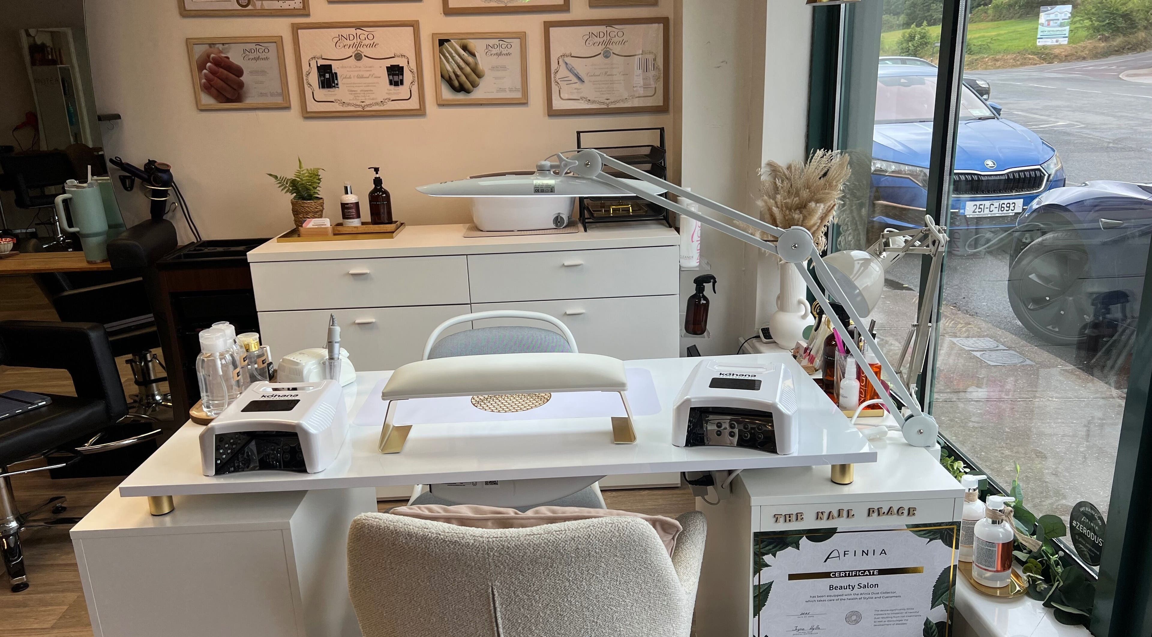 Modern nail station at The Nail Place, Coachford, County Cork, IE, featuring elegant decor and professional tools.