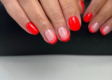 Bright red and pink manicured nails at The Nail Place, Coachford, County Cork, IE.