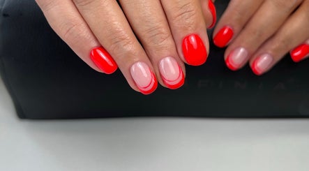 Bright red and pink manicured nails at The Nail Place, Coachford, County Cork, IE.