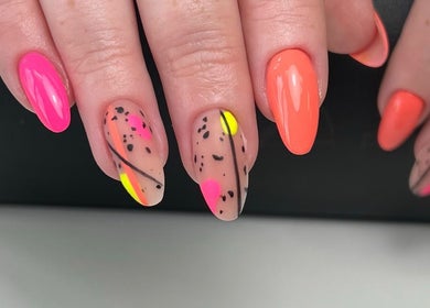 Colorful nail art at The Nail Place, Coachford, County Cork, IE, showcasing vibrant and detailed designs.