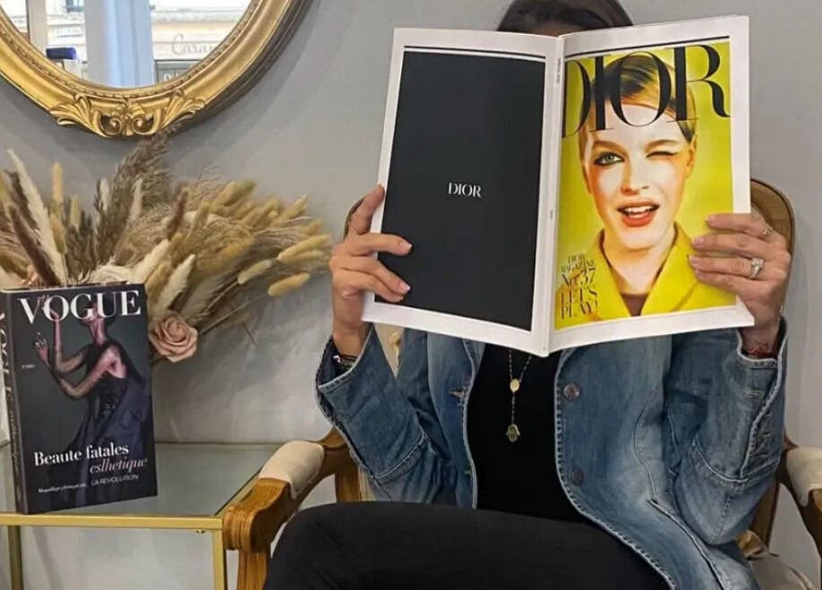 Chic seating area at Institut Caramel Paris, Paris, Île-de-France, FR, showcasing luxury magazines.
