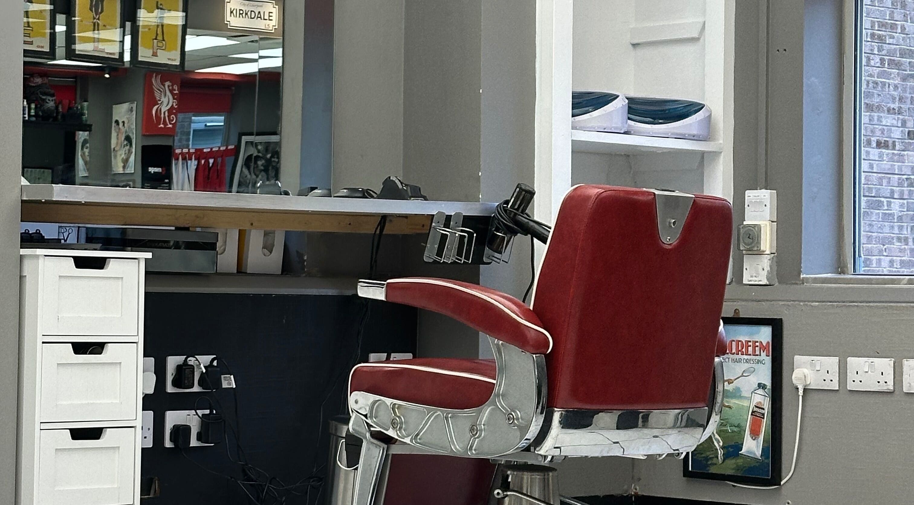 Vintage barber chair at Image Barbers, Saint Helier, St Helier, JE. Modern, inviting space.