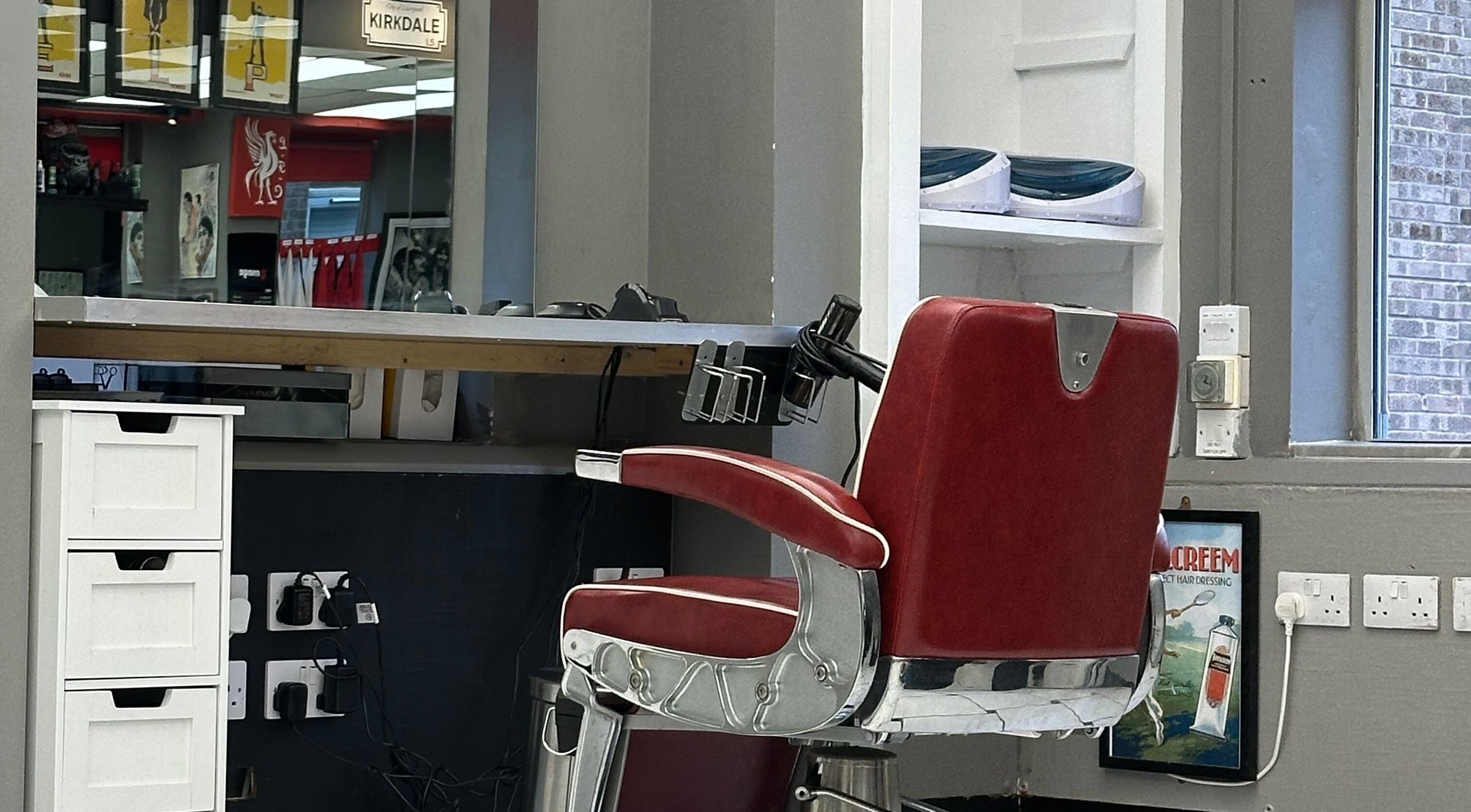 Vintage barber chair at Image Barbers, Saint Helier, St Helier, JE. Modern, inviting space.