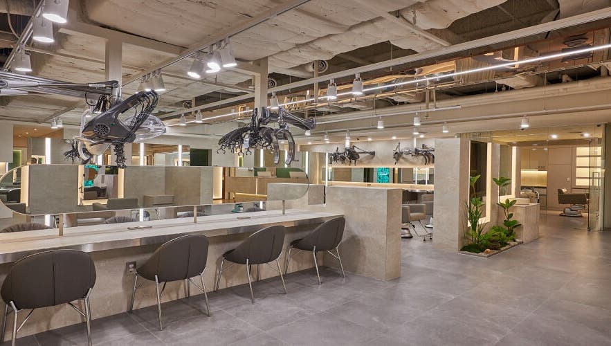 Interior of EcoJardin Jamsil Lotte Tower Branch 에코쟈뎅, Seoul, showcasing sleek, modern salon design.