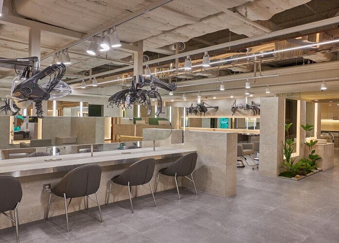 Interior of EcoJardin Jamsil Lotte Tower Branch 에코쟈뎅, Seoul, showcasing sleek, modern salon design.