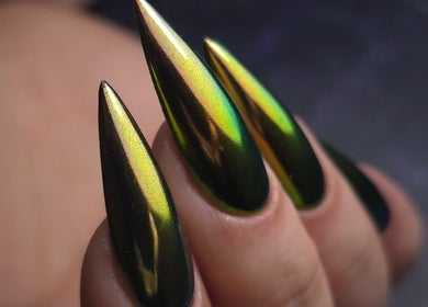 Luxury iridescent nails at Italmas Nails Inc., New York, New York, US. Perfect for glam nail art lovers.