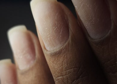 Close-up of a manicured hand at Italmas Nails Inc., New York, New York, US showcasing natural nail care.
