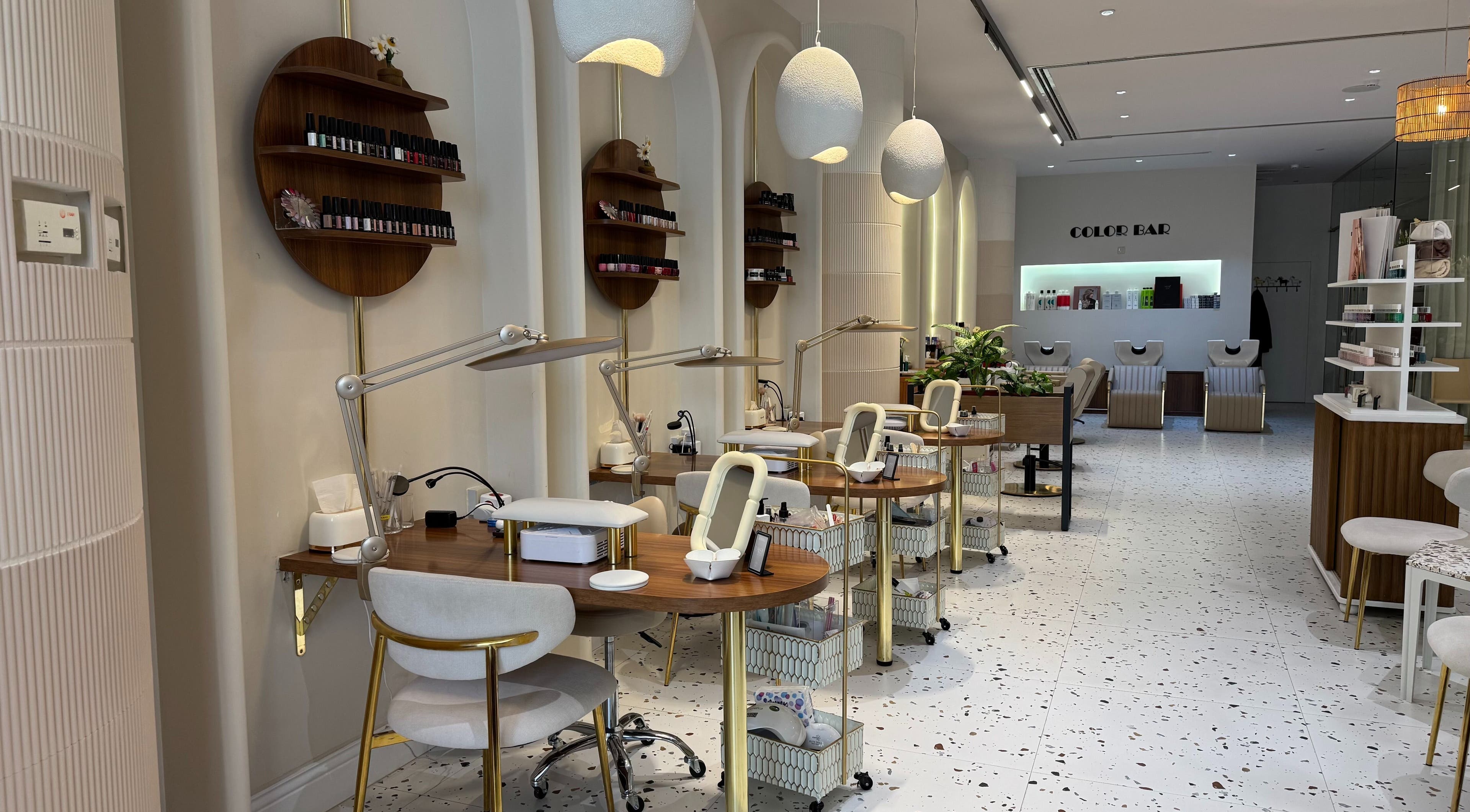 Modern nail salon at Daisy Beauty Salon, Riyadh, Riyadh Province, SA with elegant seating and decor.