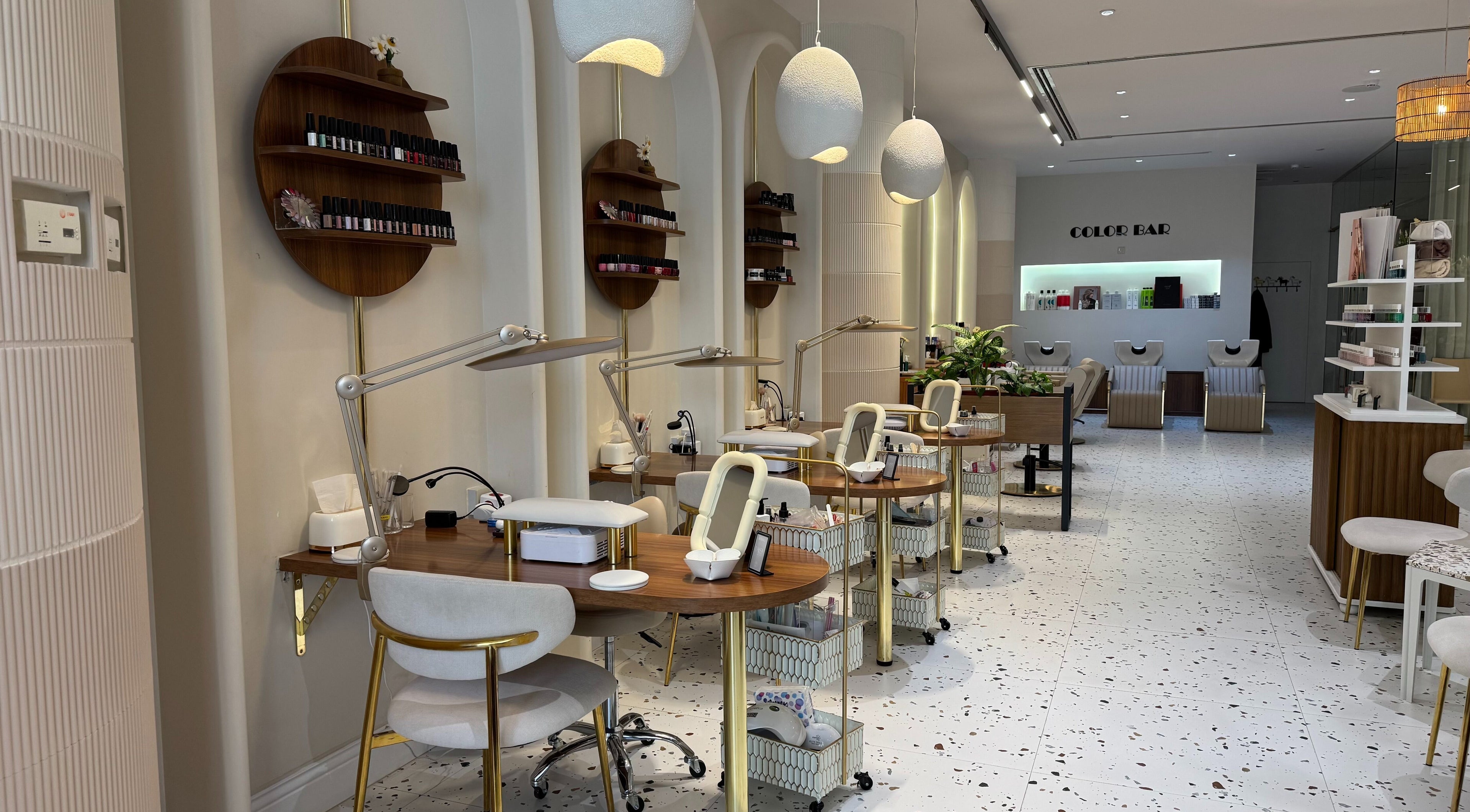 Modern nail salon at Daisy Beauty Salon, Riyadh, Riyadh Province, SA with elegant seating and decor.