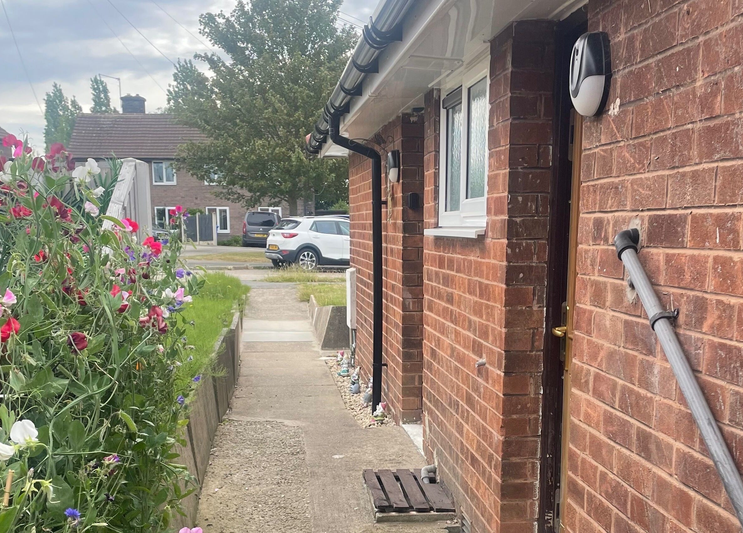 Brick exterior with garden view at Lashes After Hours, Sheffield, England, GB.