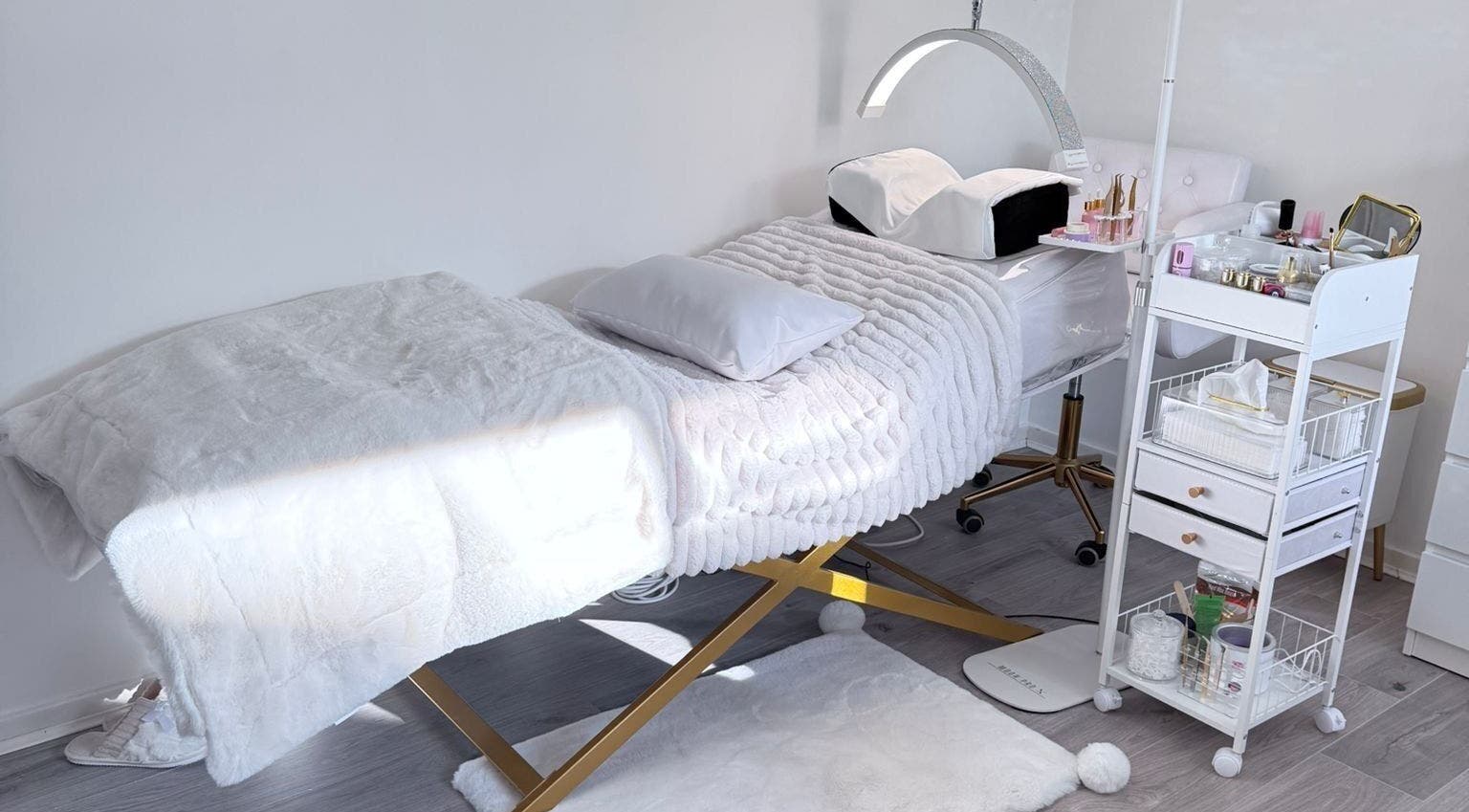 Luxurious treatment bed in Rafaela Lima Beauty, Peterborough, England, GB offers comfort and elegance.