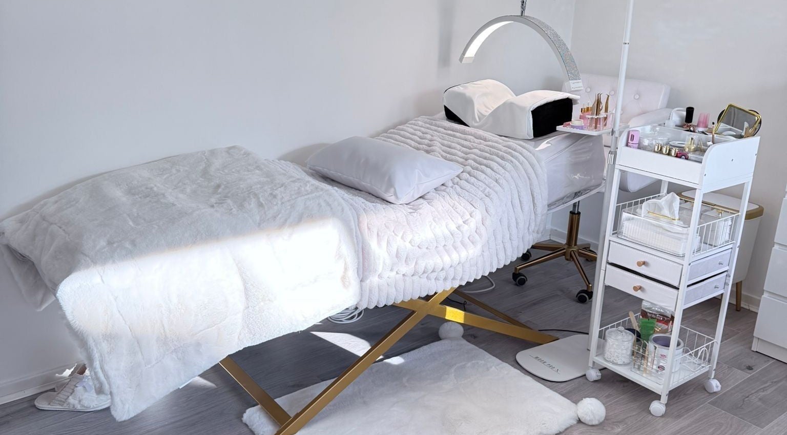 Luxurious treatment bed in Rafaela Lima Beauty, Peterborough, England, GB offers comfort and elegance.