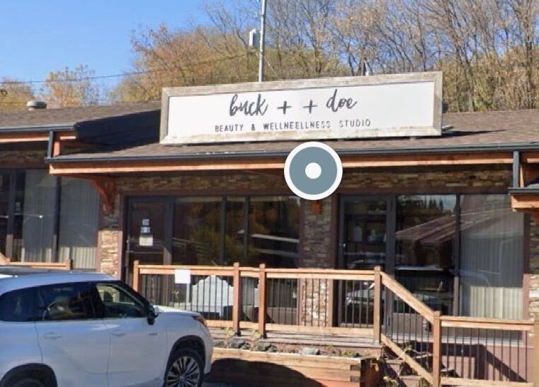 Sunkissed Luxe exterior view in Kenora, Ontario. Rustic charm with welcoming ambiance.