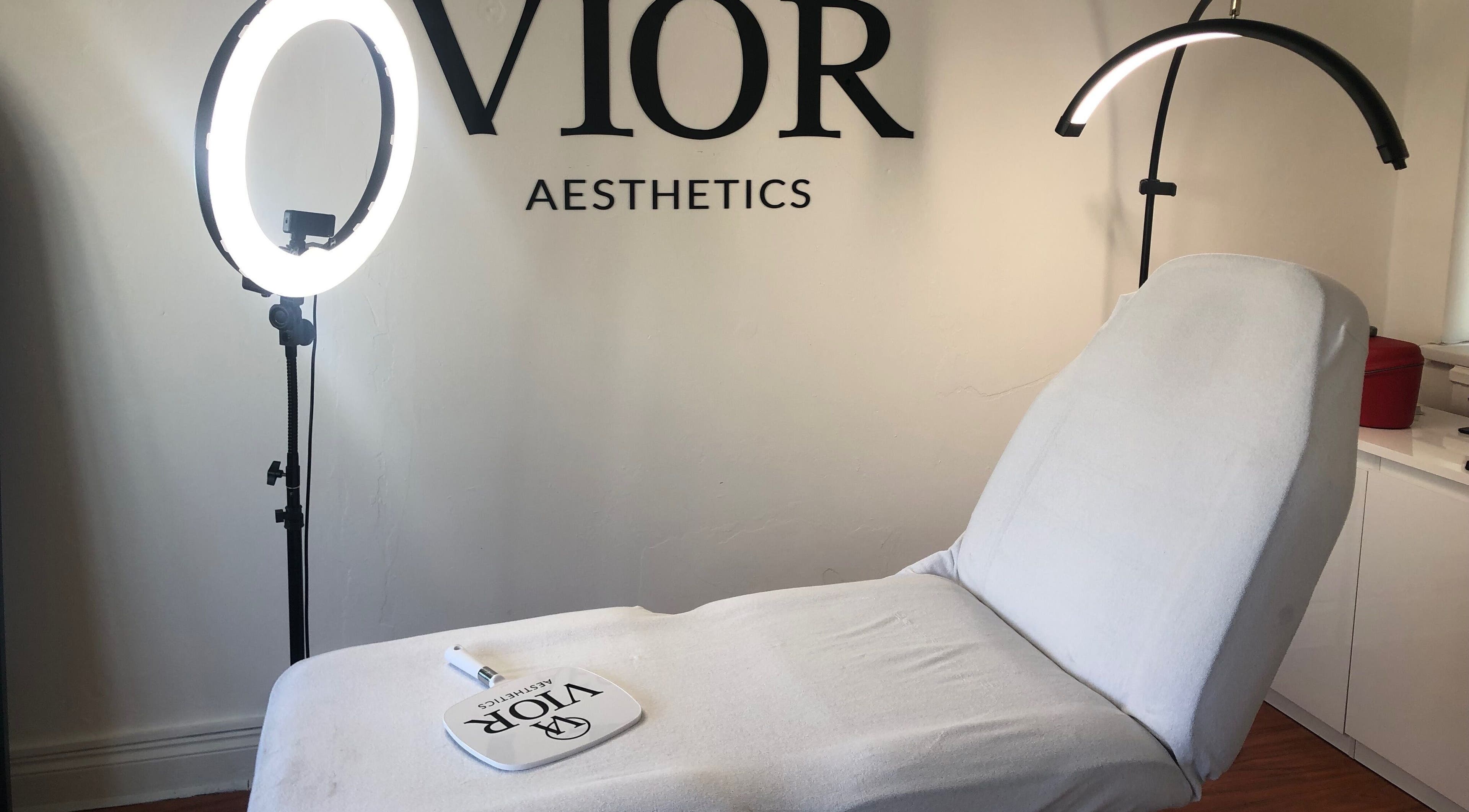 Treatment chair in VIOR Aesthetics, Stockport, England, GB elegantly lit by ring light.