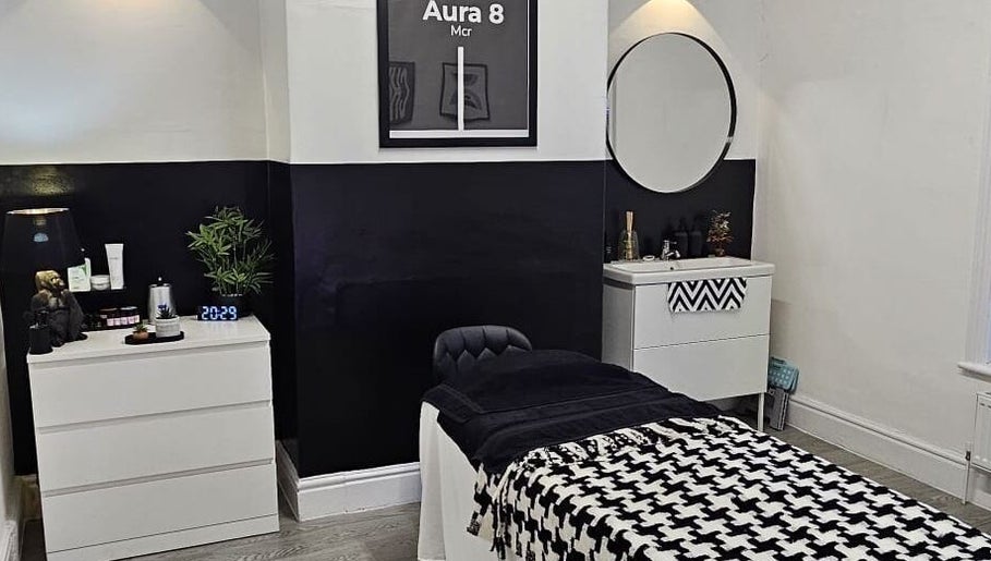 Serene treatment room at Aura 8 Mcr in Prestwich, England, GB with modern decor and soothing ambiance.