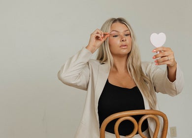 Woman applying lashes at Lashed by Ches, Johnson City, Tennessee, US.