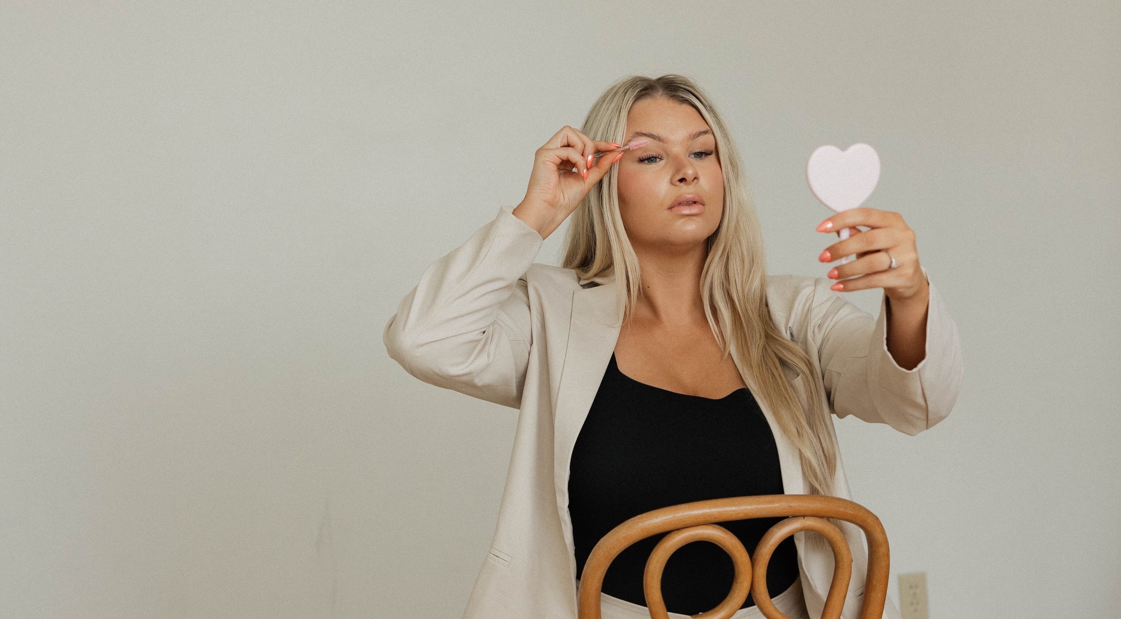 Woman applying lashes at Lashed by Ches, Johnson City, Tennessee, US.
