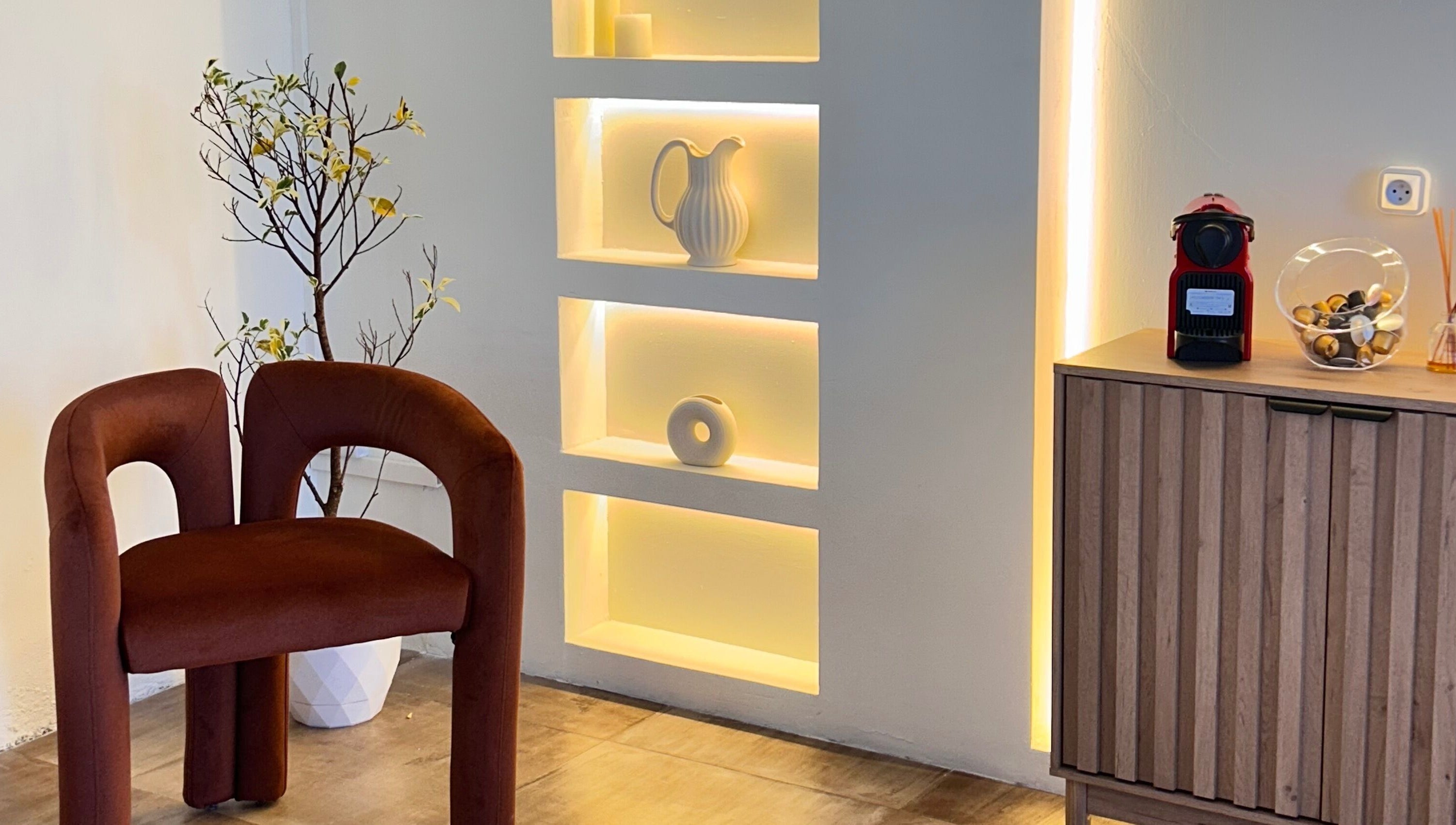 Modern chair and shelf in Alké Studio, Vacoas-phoenix, Plaines Wilhems District, MU. Elegant and warm design.