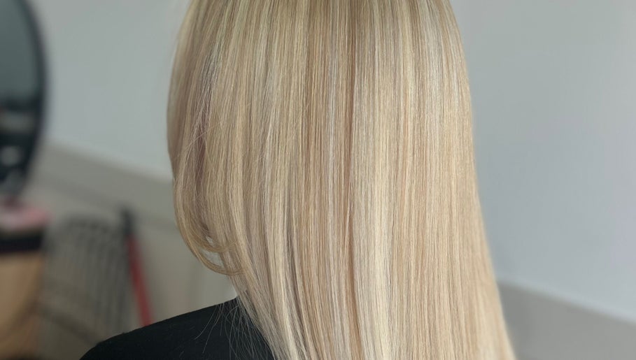 Sleek blonde hairstyle at Styled By Tee Swales in Hartlepool, England, GB, showcasing precise styling.