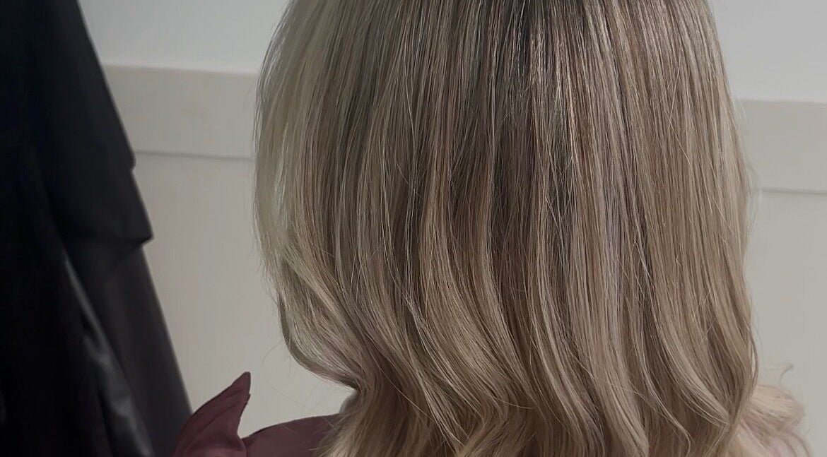 Styled By Tee Swales in Hartlepool, England. Close-up of elegantly styled blonde hair.