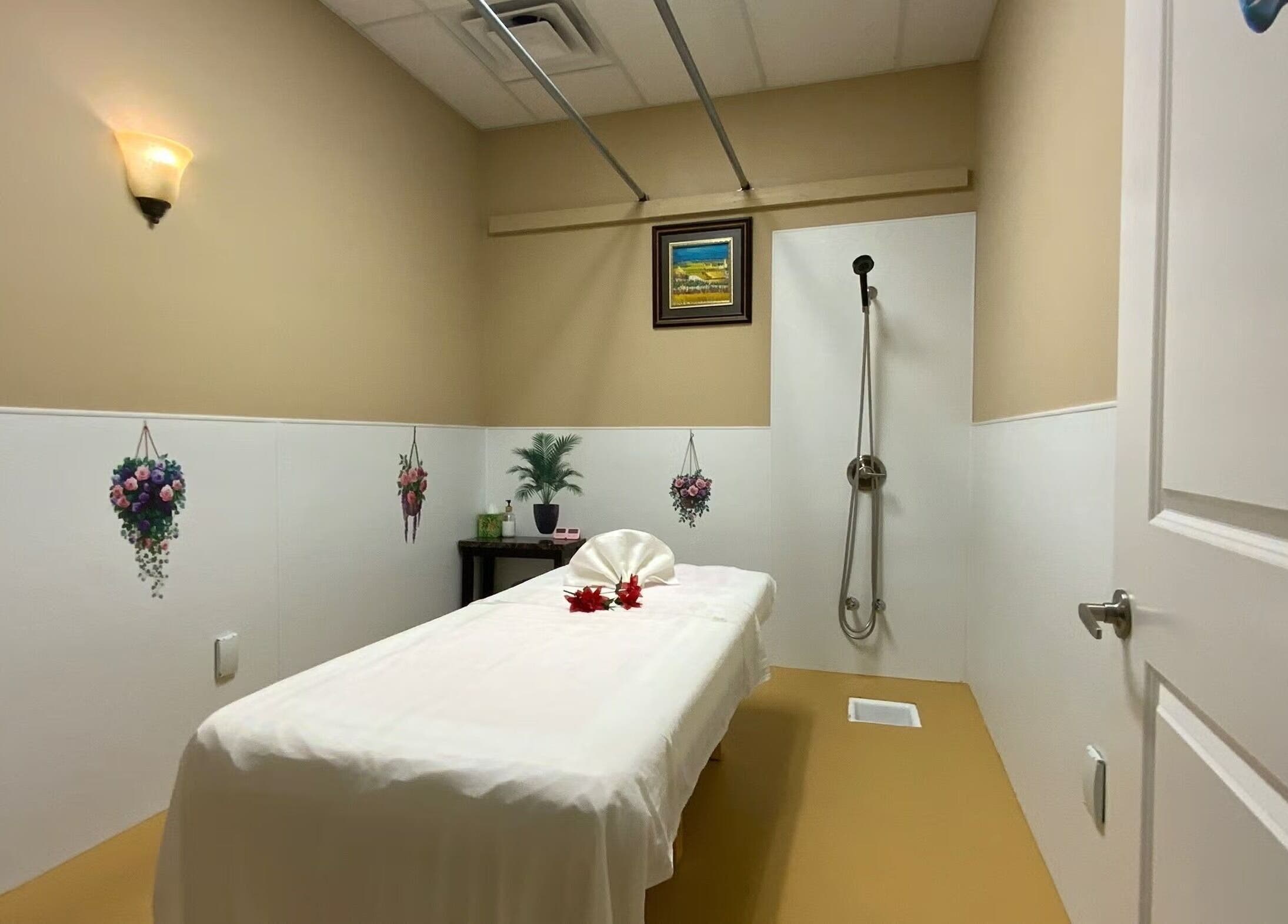 Relaxing massage room at Warm Foot Spa, Atascadero, California, US with a plush massage table and calming decor.