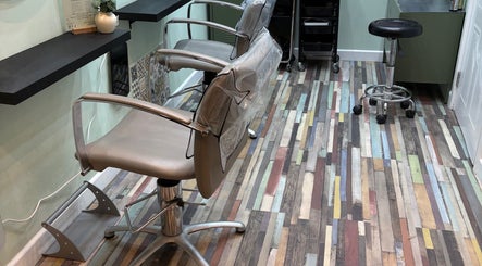 Modern salon chairs in Secret Sanctuary, Park Gate, England, GB offering a stylish beauty experience.