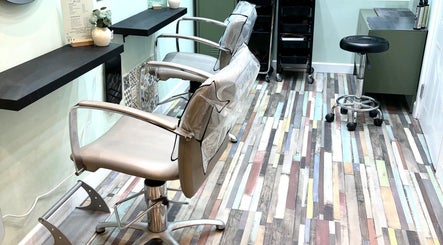 Stylish salon setup at Secret Sanctuary, Park Gate, England, GB, featuring modern chairs and chic décor.
