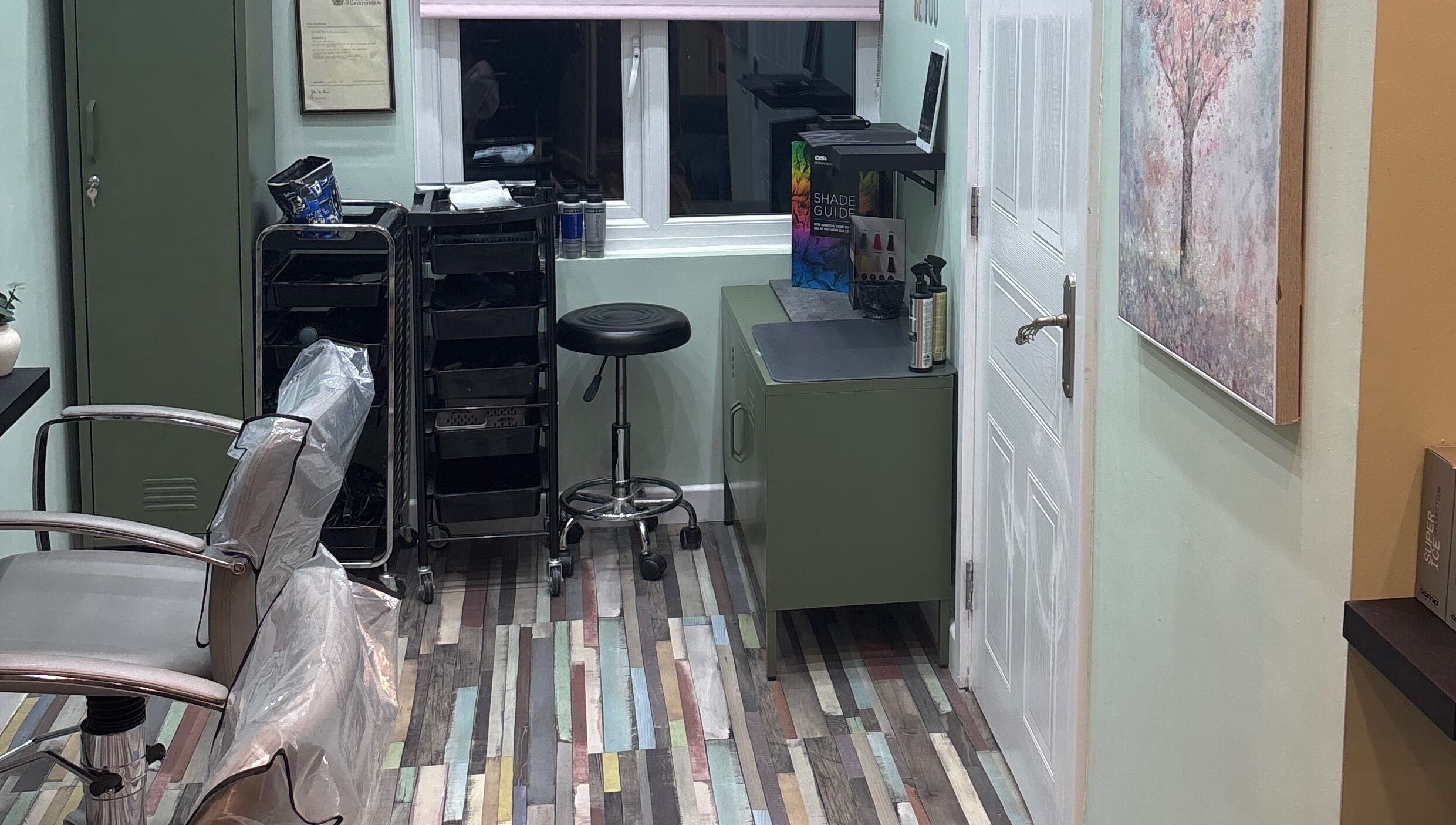 Stylish salon setup at Secret Sanctuary, Park Gate, England, GB with modern equipment and vibrant decor.