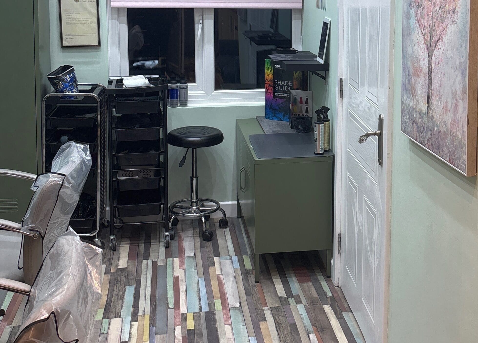 Stylish salon setup at Secret Sanctuary, Park Gate, England, GB with modern equipment and vibrant decor.