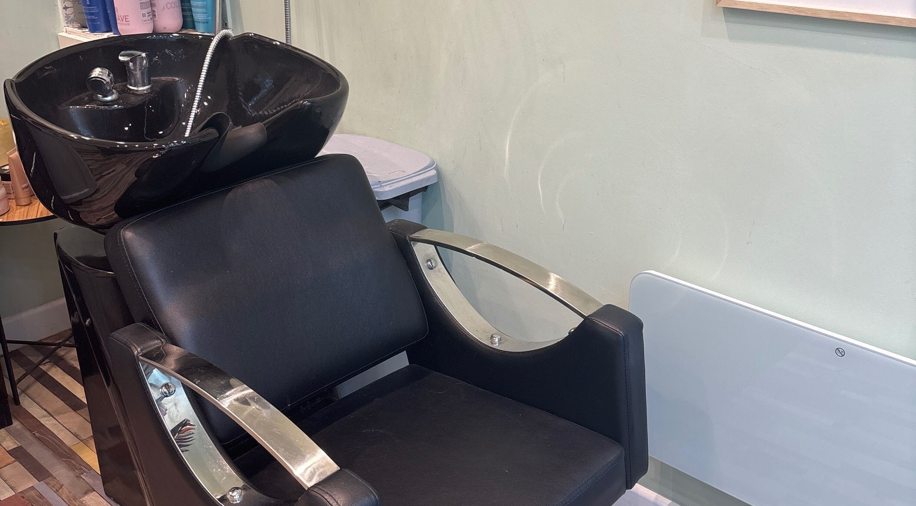 Wash station at Secret Sanctuary in Park Gate, England, GB offering a serene beauty experience.