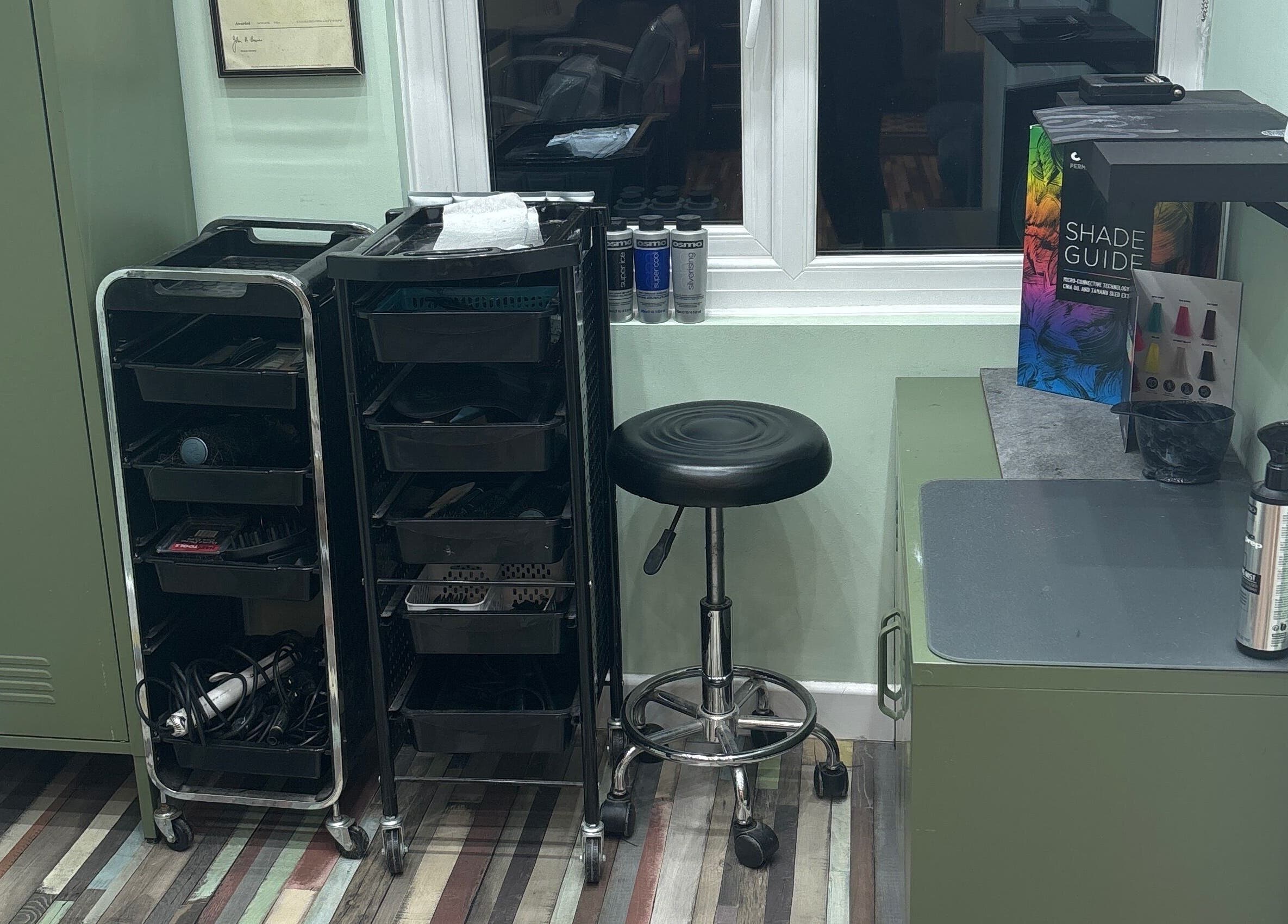 Modern salon station at Secret Sanctuary, Park Gate, England, GB, showcasing professional beauty tools and chic decor.