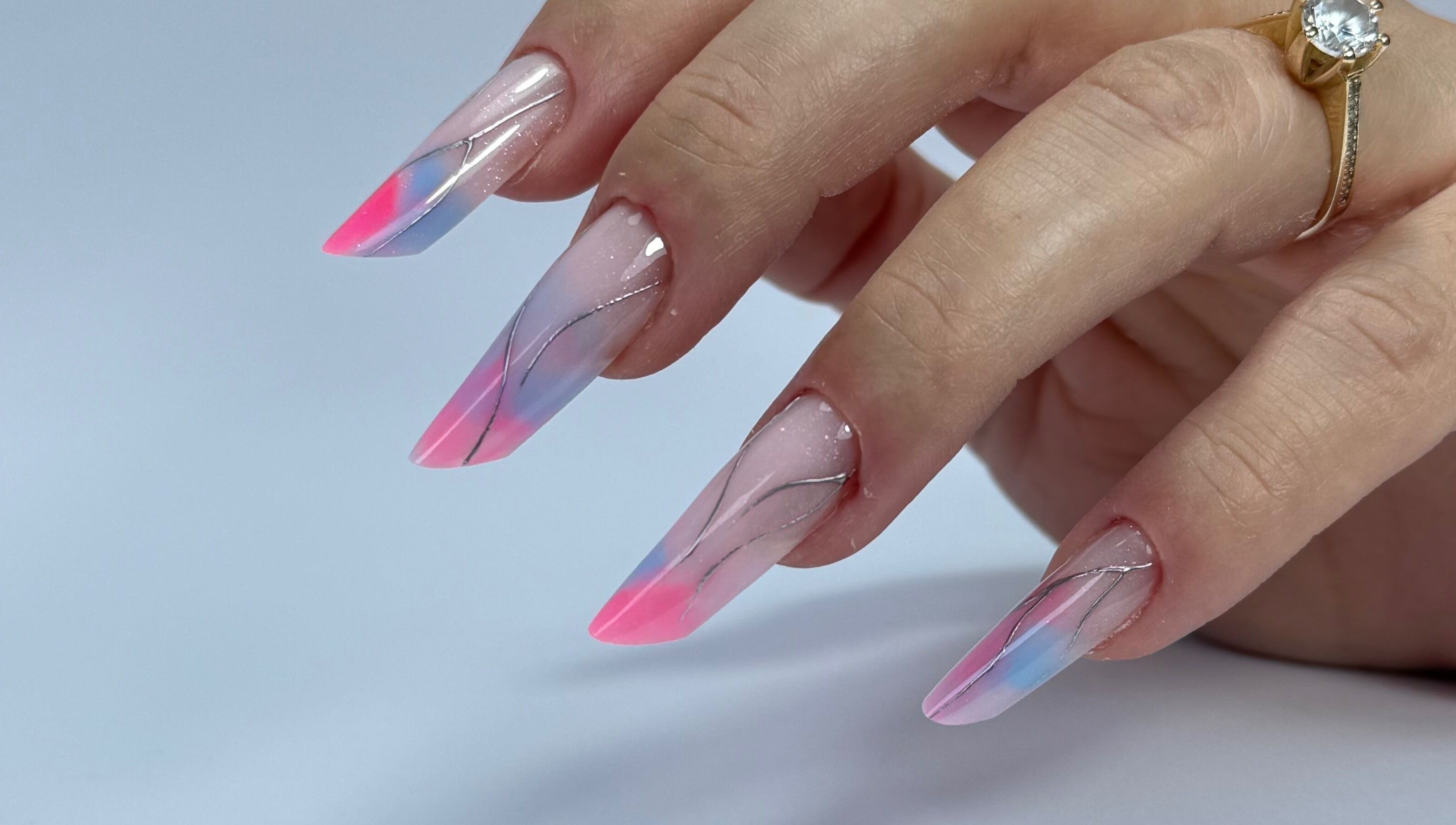 Stunning pastel nail art at Giulia Nails Atelier, Norwich, England, GB showcasing intricate swirl designs.