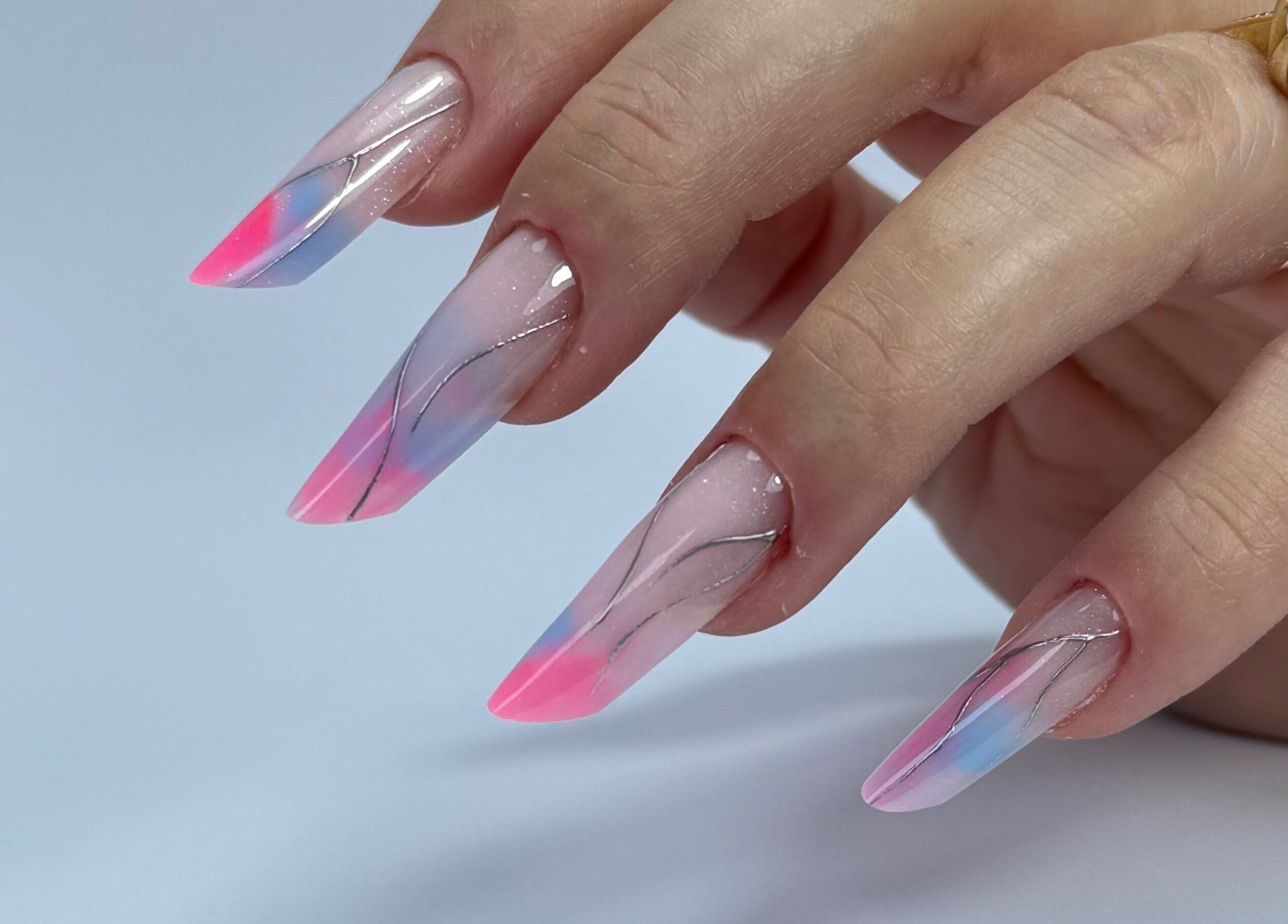 Stunning pastel nail art at Giulia Nails Atelier, Norwich, England, GB showcasing intricate swirl designs.