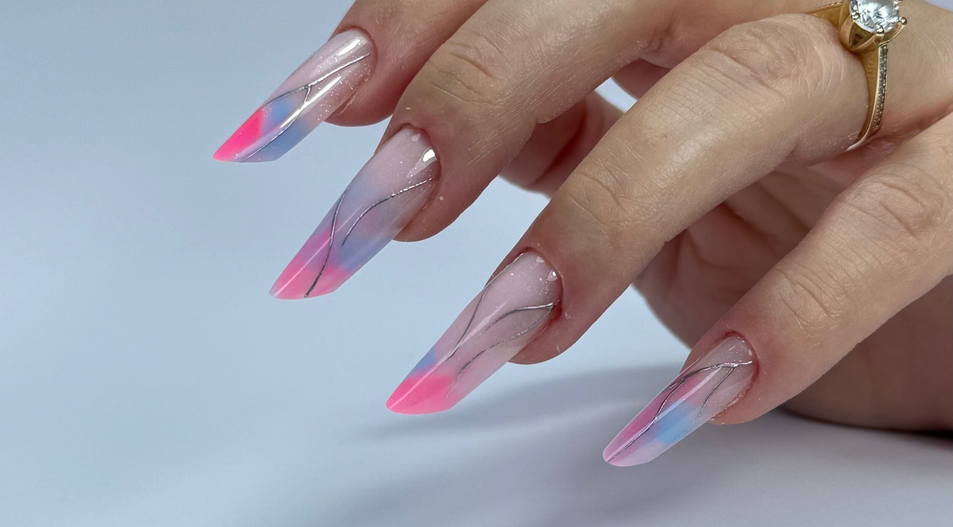 Stunning pastel nail art at Giulia Nails Atelier, Norwich, England, GB showcasing intricate swirl designs.