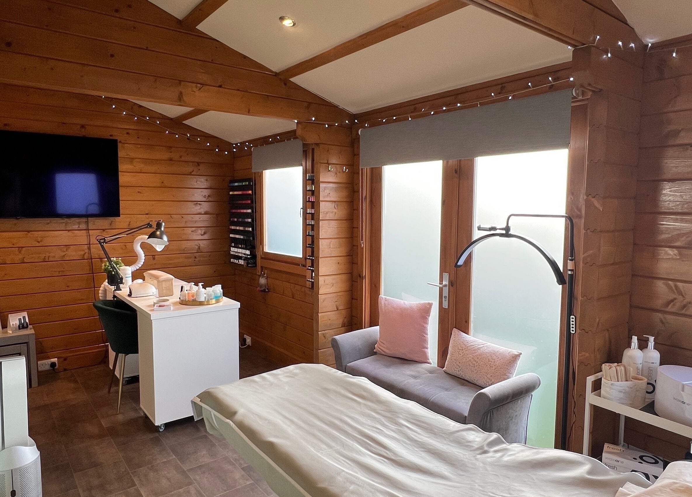 Interior of Beau Boutique in Clovenfords featuring cozy treatment setup in Scottish Borders, GB.