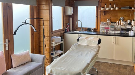 Beau Boutique treatment room in Clovenfords, Scottish Borders, GB with a cozy bed and serene ambience.