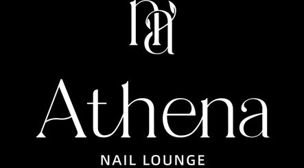 Elegant logo of Athena Nail Lounge in Spring, Texas, US, showcasing sophisticated typography on a black backdrop.