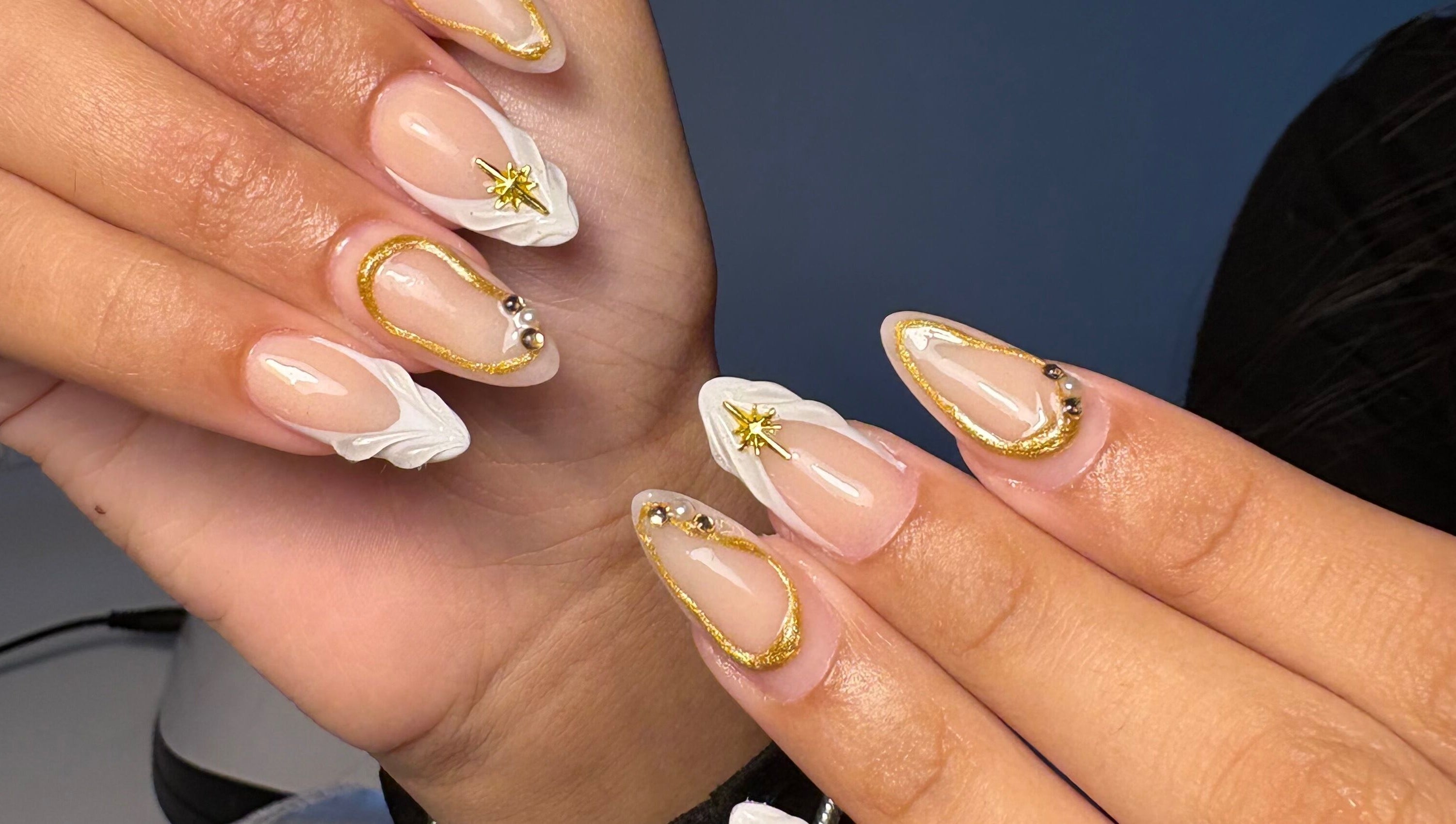Elegant gold-accented nails at xx.madebybia in Peterborough, England, GB.
