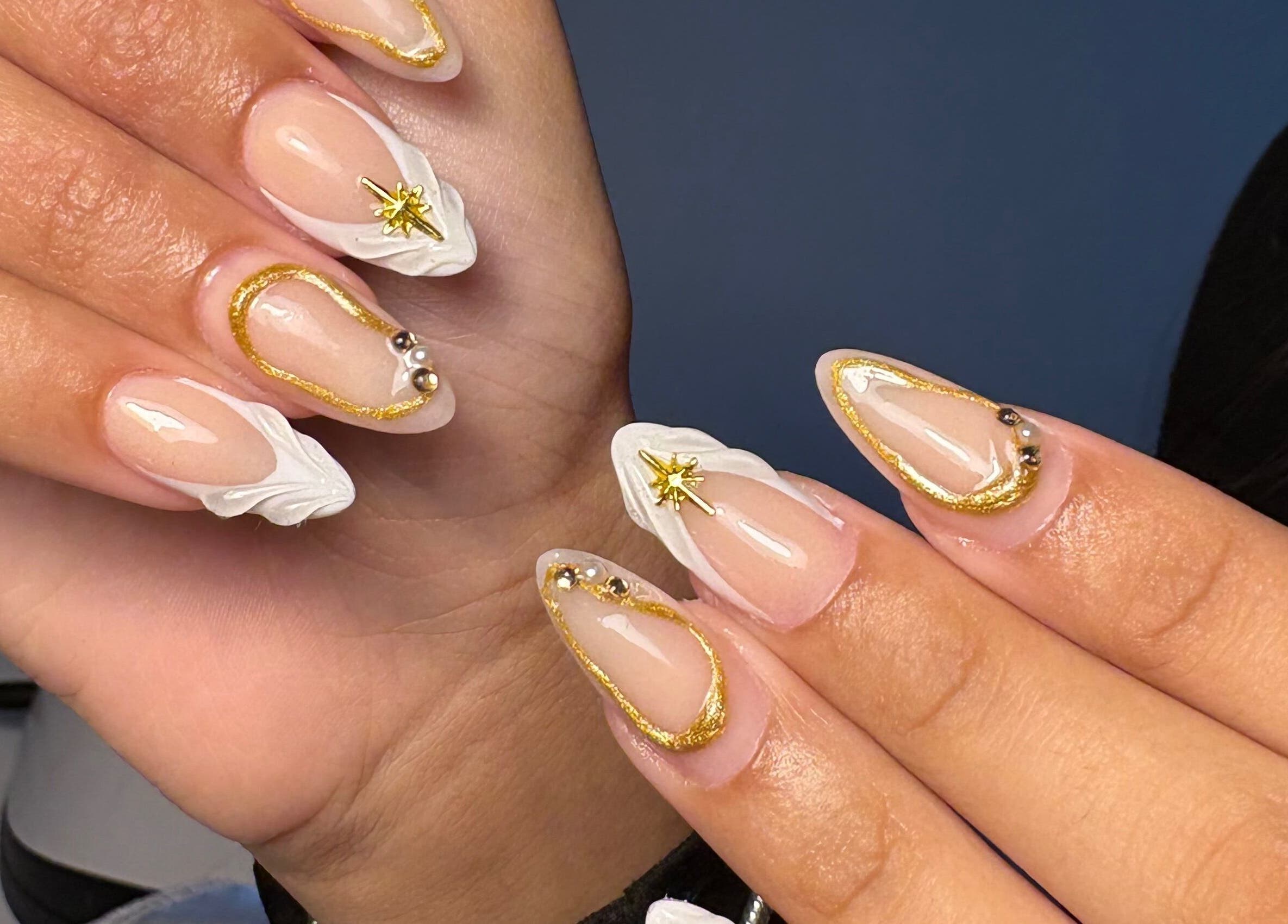 Elegant gold-accented nails at xx.madebybia in Peterborough, England, GB.